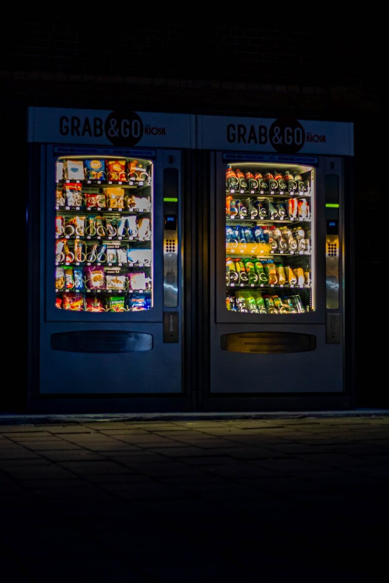 black and yellow vending machine